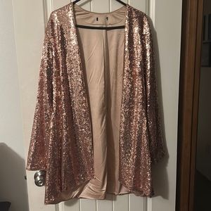 Torrid pink sequin jacket.
